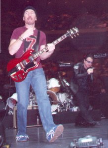 Bono and Edge onstage in Boston's Fleet Center, 8th June 2001