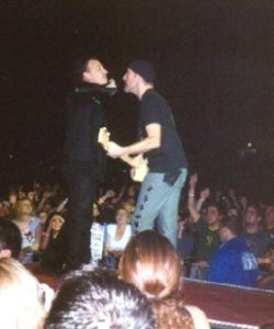 Bono and The Edge at the tip of the heart in Madison Square Garden, 25th October 2001