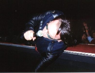 Photo of Bono lying on the heart in Madison Square Garden, 25th October 2001